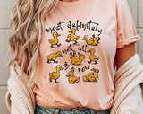 "Most Definitely Not In A Row Duck" design on a peach unisex t-shirt