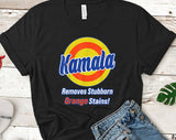 "Kamala Removes Orange Stains" design on a black unisex t-shirt