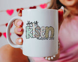 "He Is Risen Matthew 28:6" design on a white ceramic coffee mug