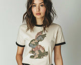 "Camo Bunny Patchwork" design on a natural ringer t-shirt with black contrast trim