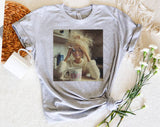 "Doll Face Meme Hot Mess Coffee" design on a heather gray unisex t-shirt