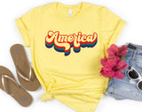 "America Retro USA" design on a pale yellow unisex t-shirt