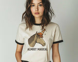 "Almost Magical Unicorn Road Cone" design on a natural ringer t-shirt with black contrast trim