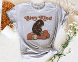 "Stay Kind Baby Punch Monkey" design on a heather gray unisex t-shirt