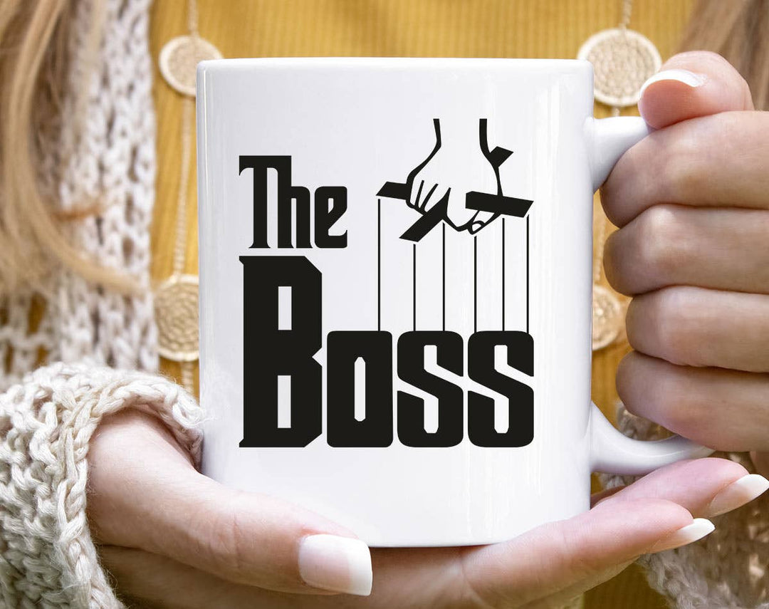 "The Boss" design on a white ceramic coffee mug