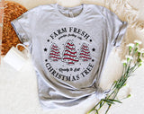 "Farm Fresh Christmas Tree Cakes" design on a heather gray unisex t-shirt