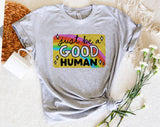 "Just Be A Good Human" design on a heather gray unisex t-shirt