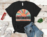 "Sunkissed Rainbow" design on a black unisex t-shirt