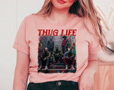 "Thug Life Horror Icons" design on a peach unisex t-shirt