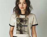 "Girls Will Be Girls Medusa" design on a natural ringer t-shirt with black contrast trim