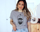"Moon Magic Mushroom" design on a heather gray unisex t-shirt