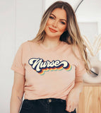 "Nurse Multi Color Retro" design on a peach unisex t-shirt