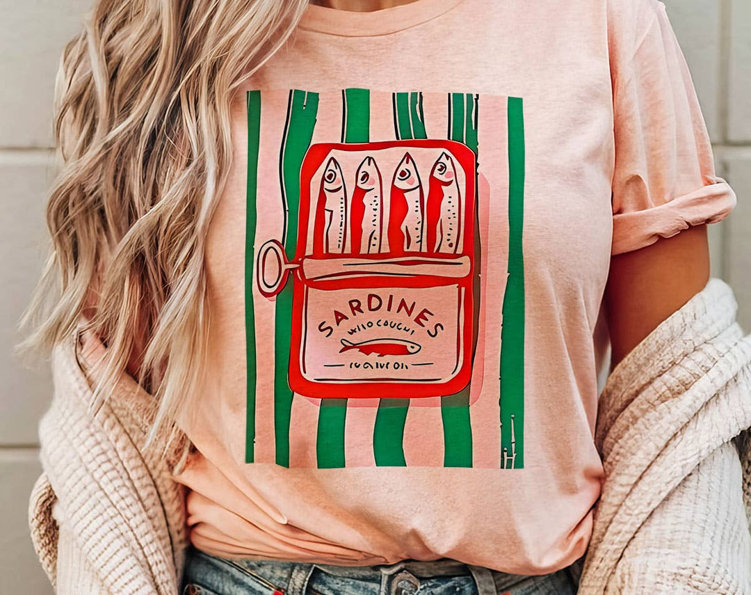 "Sardines Tinned Fish French" design on a peach unisex t-shirt