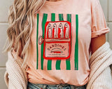 "Sardines Tinned Fish French" design on a peach unisex t-shirt