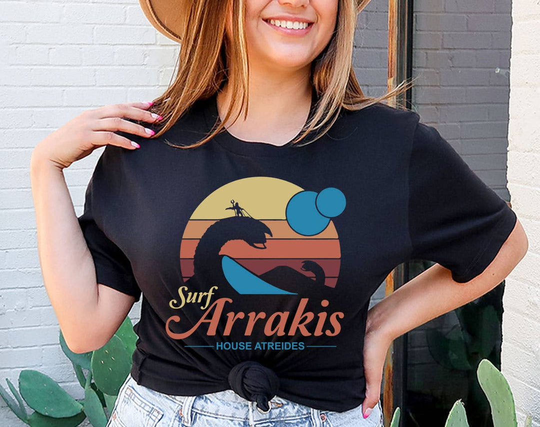 "Surf Arrakis" design on a black unisex t-shirt