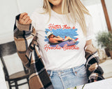 "Hotter Than Hoochie Coochie" design on a white unisex t-shirt