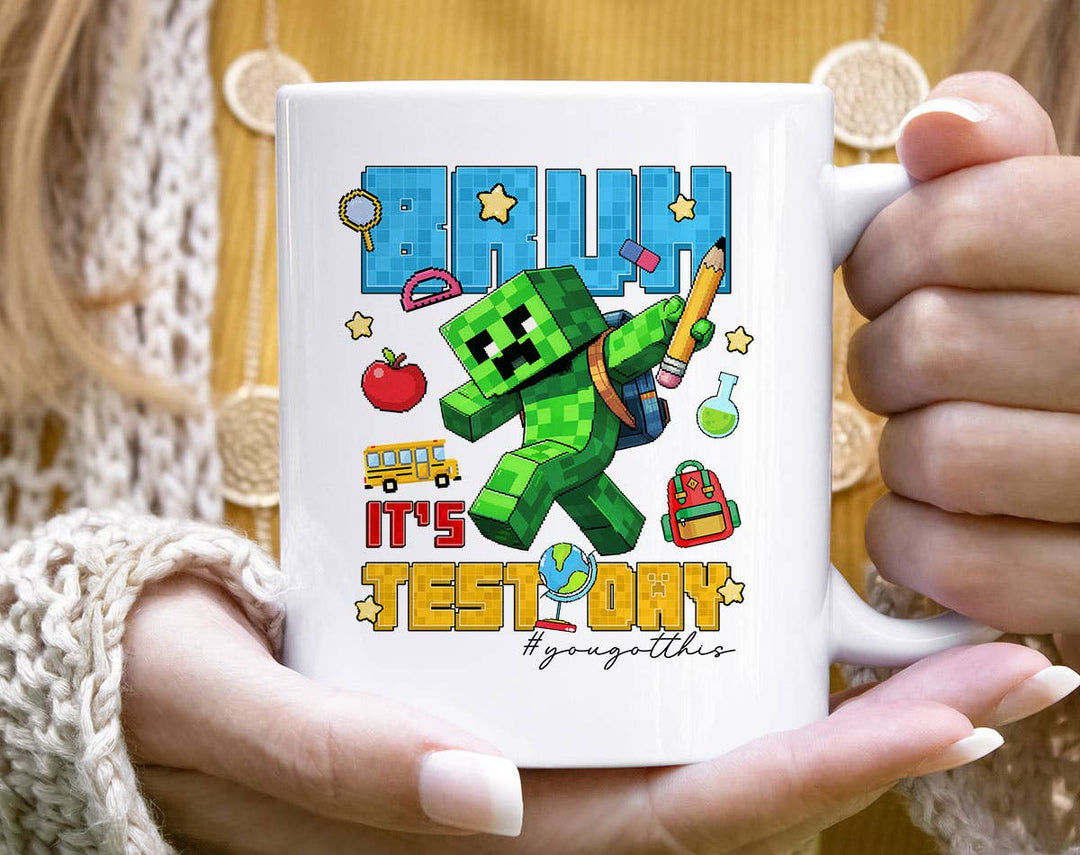 "Bruh It's Test Day" design on a white ceramic coffee mug