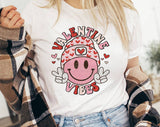 "Valentine Vibes Smiley Peace" design on a white unisex t-shirt