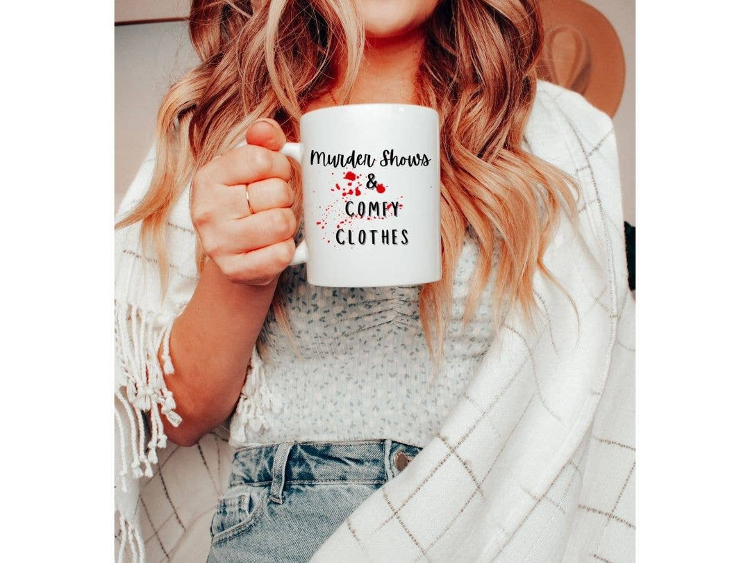"True Crime Murder Shows and Comfy Clothes" design on a white ceramic coffee mug
