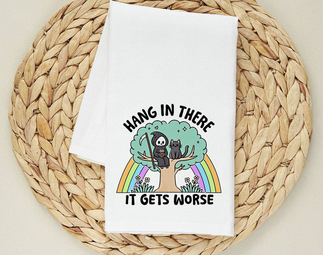 "Hang In There, It Gets Worse Cat" design on a white 28 x 28 inch flour sack tea towel