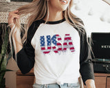"USA Faux Patchwork American Flag" design on a white baseball raglan tee with black sleeves
