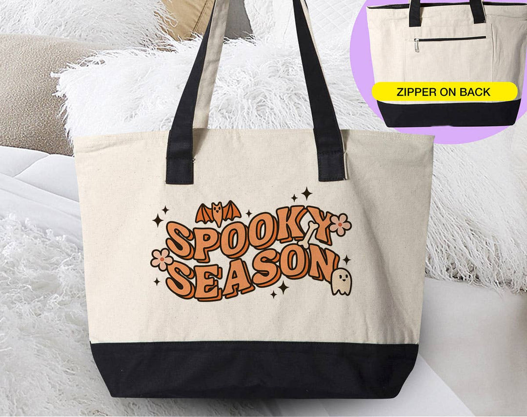 "Spooky Season" design on a natural canvas zippered tote bag
