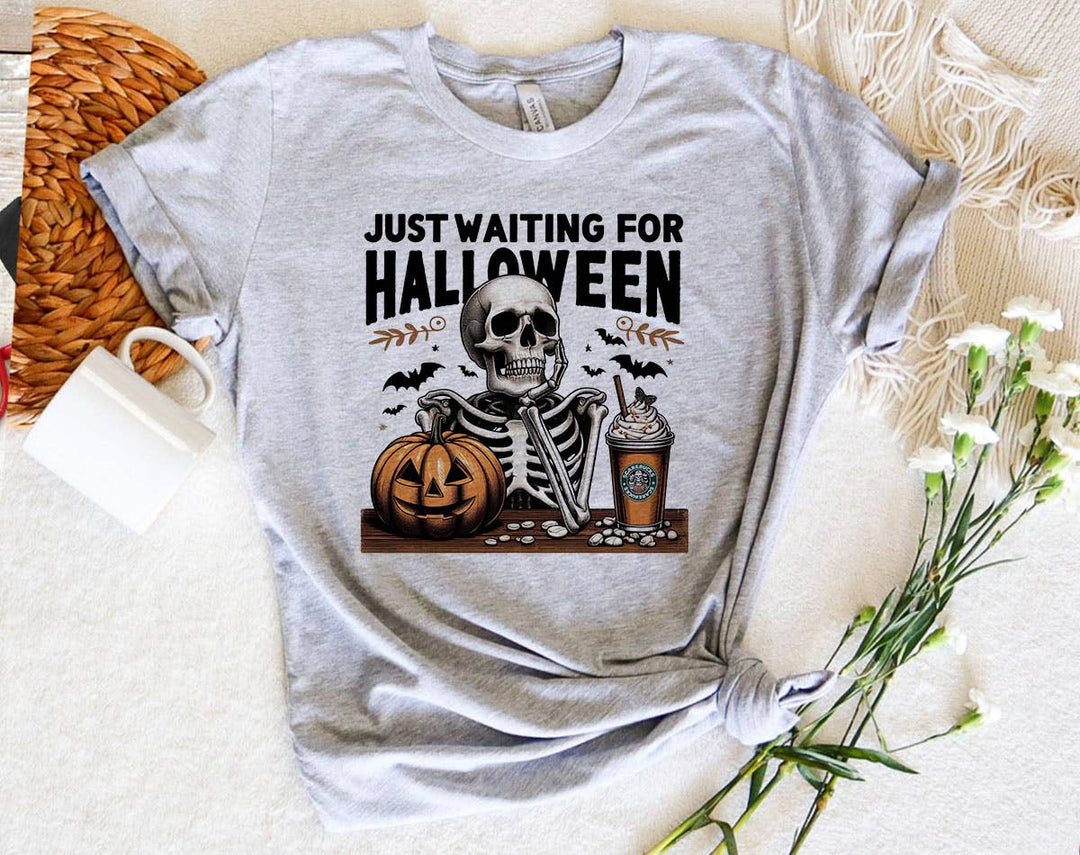 "Just Waiting For Halloween Skeleton" design on a heather gray unisex t-shirt