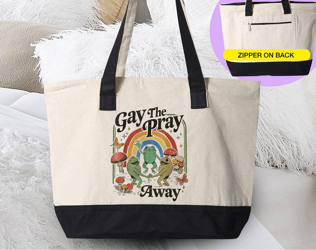 "Gay The Pray Away" design on a natural canvas zippered tote bag