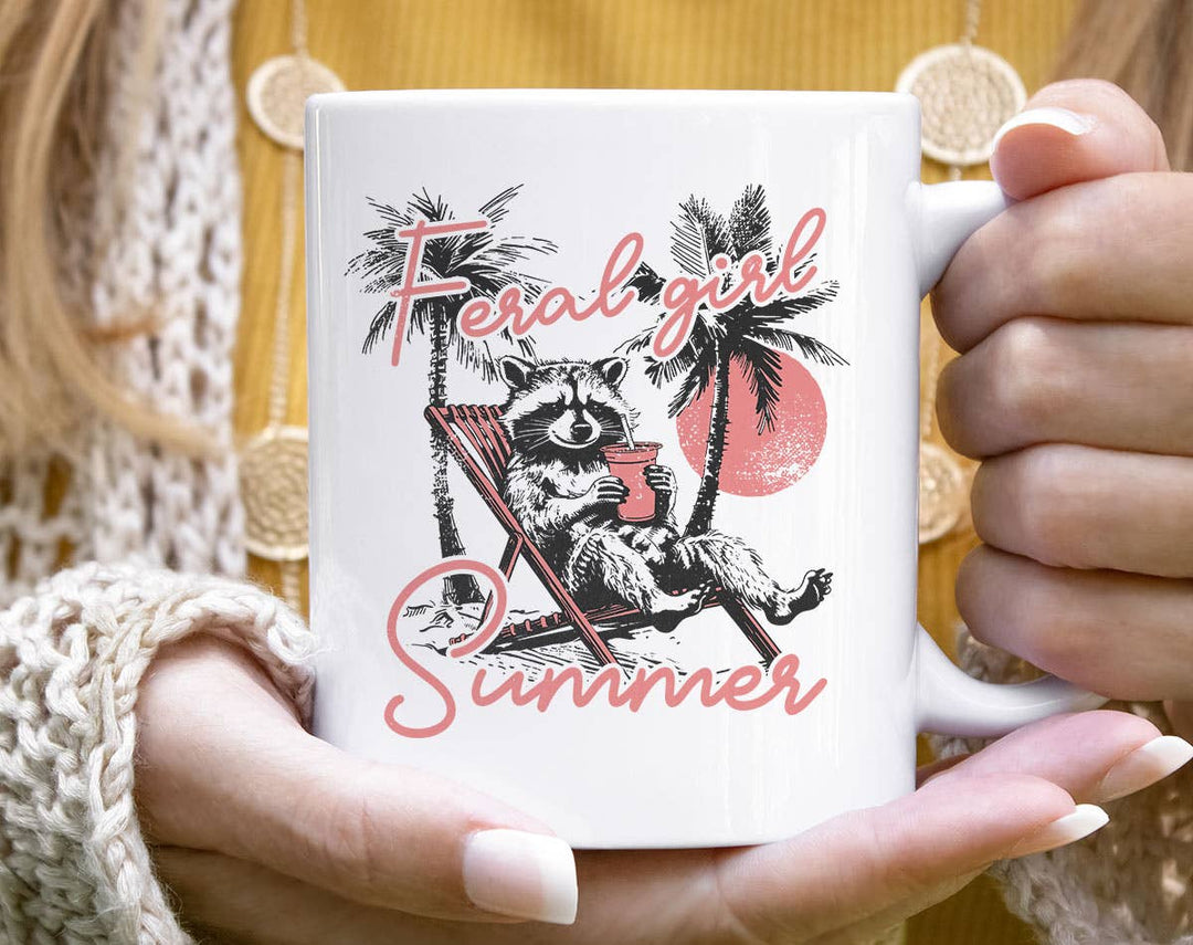 "Feral Girl Summer" design on a white ceramic coffee mug