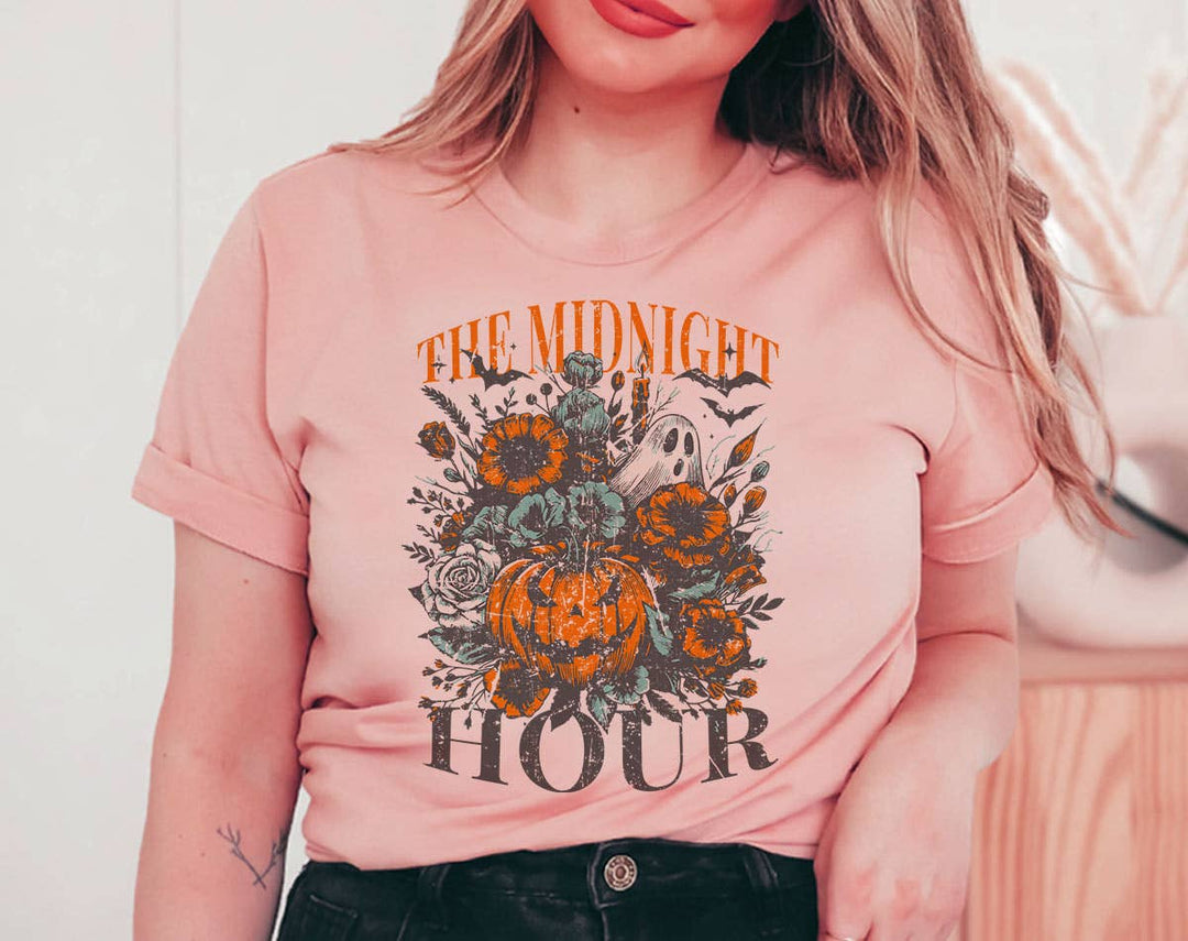 "The Midnight Hour Retro Pumpkin" design on a peach unisex t-shirt