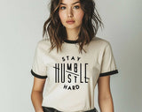 "Stay Humble, Hustle Hard" design on a natural ringer t-shirt with black contrast trim