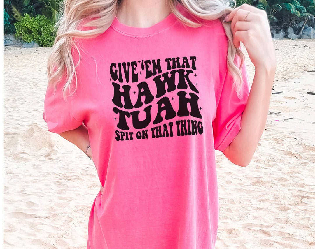 "Give 'Em That Hawk Tuah" design on a pink watermelon Comfort Colors t-shirt