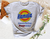 "Kamala Removes Orange Stains" design on a heather gray unisex t-shirt