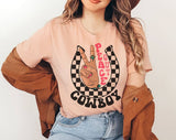 "Peace Out Cowboy" design on a peach unisex t-shirt