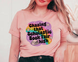 "Chasing That Scholastic Book Fair High" design on a peach unisex t-shirt
