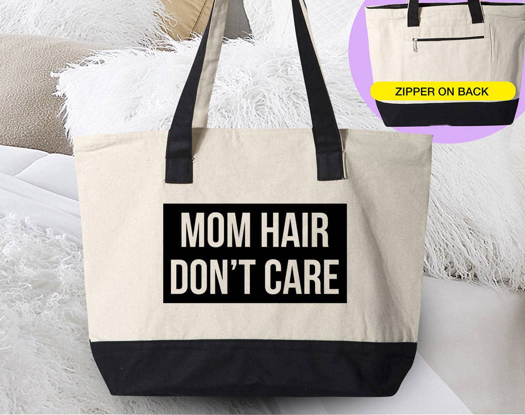 "Mom Hair Don't Care" design on a natural canvas zippered tote bag