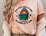 "This Little Light Of Mine Dumpster Fire" design on a peach unisex t-shirt