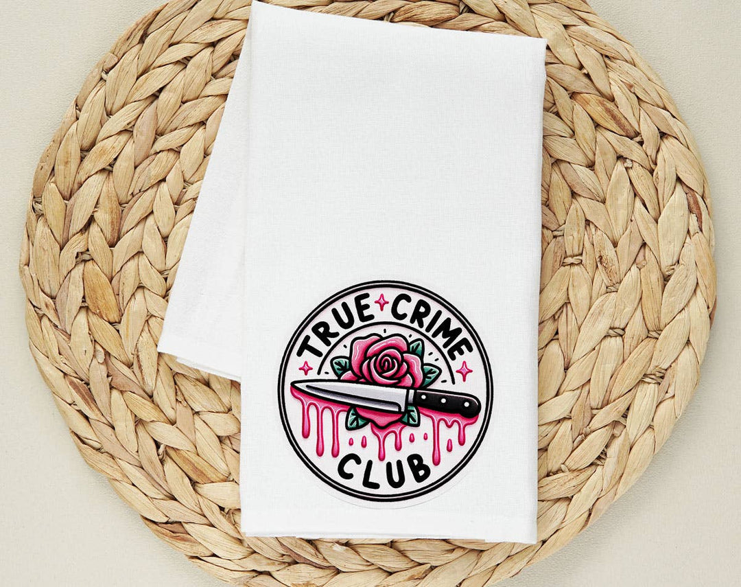 "True Crime Club Rose" design on a white 28 x 28 inch flour sack tea towel