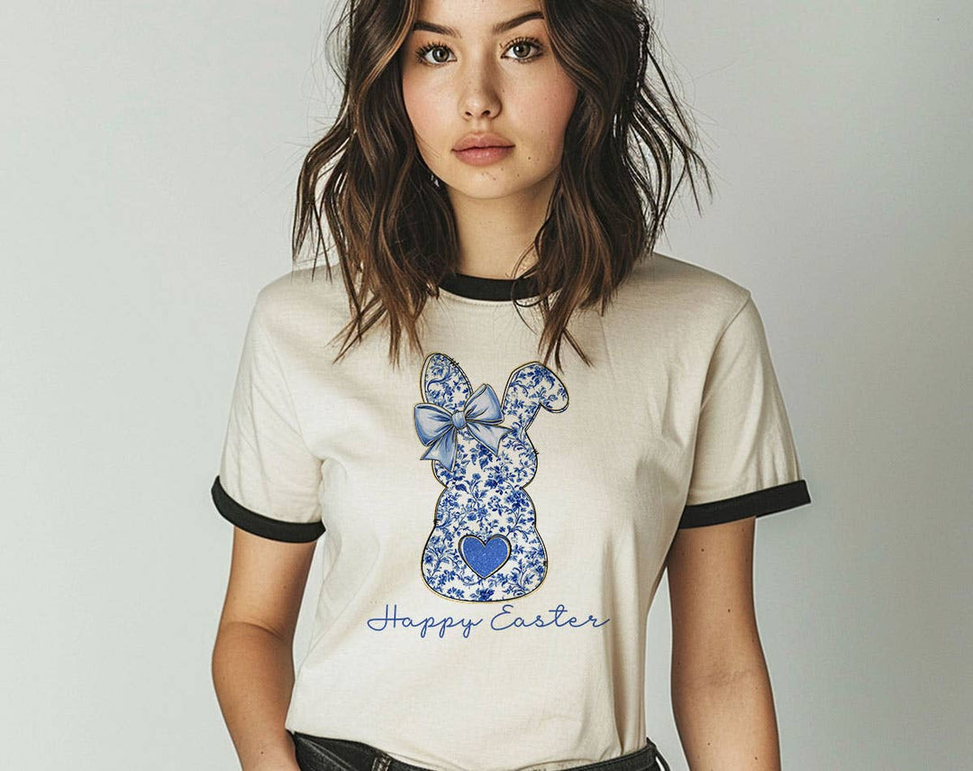 "Happy Easter Blue Bunny" design on a natural ringer t-shirt with black contrast trim