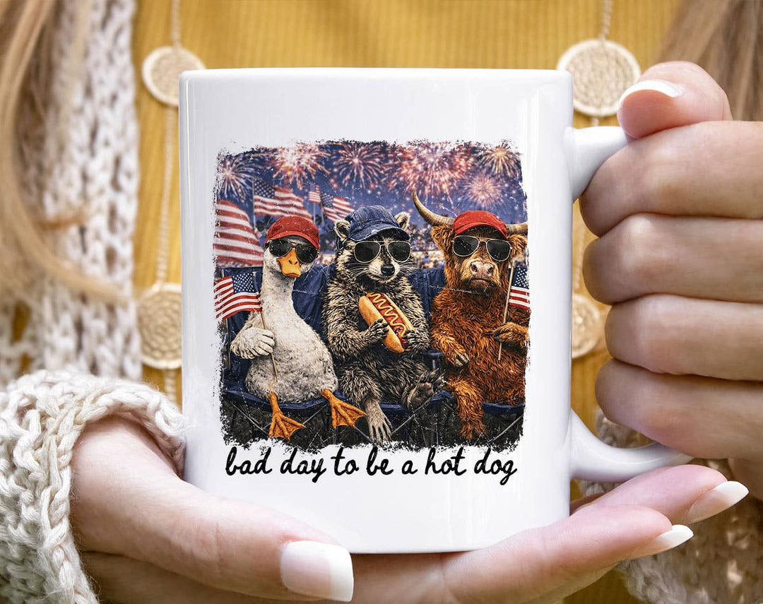 "Bad Day To Be A Hotdog" design on a white ceramic coffee mug