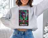 "The Stoner Tarot Skeleton Cannabis" design on an ash gray unisex crewneck sweatshirt