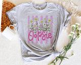 "Oopsie Daisy Striped" design on a heather gray unisex t-shirt