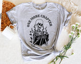 "One More Chapter Skeleton" design on a heather gray unisex t-shirt