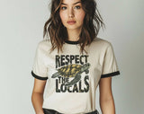 "Respect The Locals Sea Turtles" design on a natural ringer t-shirt with black contrast trim