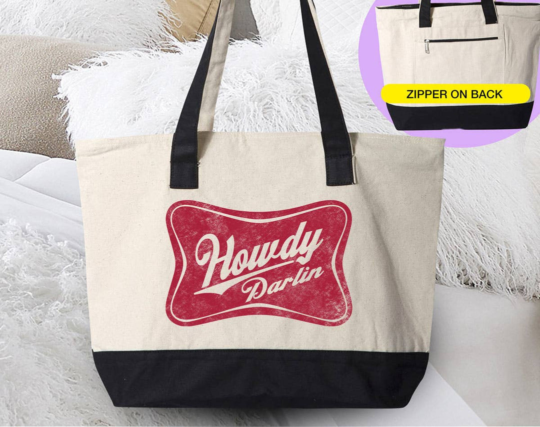 "Howdy Darlin" design on a natural canvas zippered tote bag