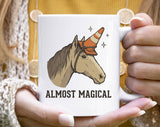 "Almost Magical Funny" design on a white ceramic coffee mug