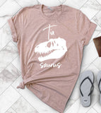 "Tia Saurus" design on a peach unisex t-shirt