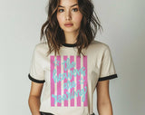"The Heavens Are Roaring Striped" design on a natural ringer t-shirt with black contrast trim