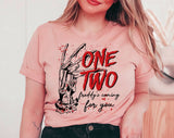 "One Two Freddy's Coming For You" design on a peach unisex t-shirt