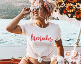 "Firecracker" design on a white unisex t-shirt